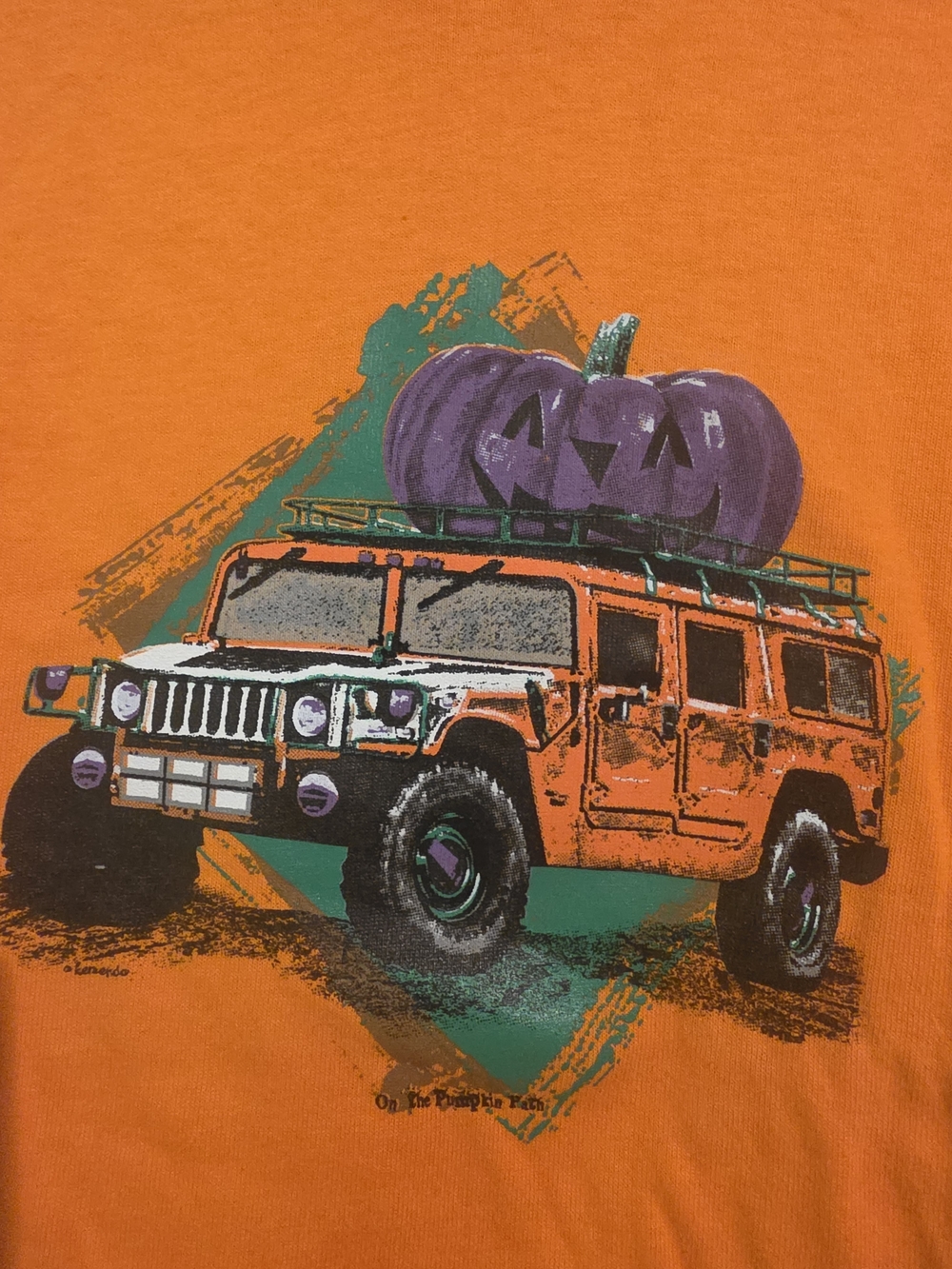 Kids Orange Halloween Graphic Tee with Purple Pumpkin and Hummer Print